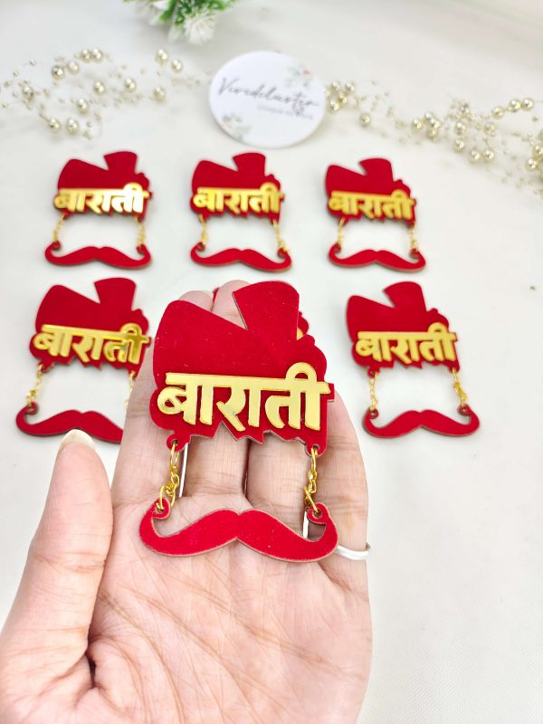 a red and gold Barati acrylic brooch with a mustache design, perfect for groom's side badges, wedding favors, and groomsmen gifts