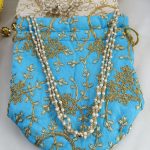 embroidery design wedding potli bags with golden accents, perfect for wedding favors, bridesmaid gifts, and Nikah ceremony accessories