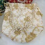 gray Colorful embroidery wedding potli bags with embroidery golden designs, suitable for wedding favors, bridesmaid gifts, and wedding accessories. Perfect for Nikah ceremonies.