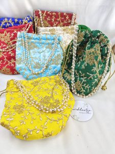 embroidery potli bags in various colors, ideal for wedding accessories, bride wedding favors, and special giveaways for Nikah ceremonies