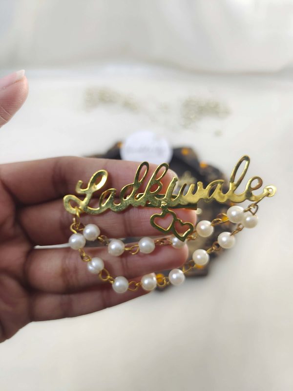 Ladkiwale brooch with pearl and bead embellishments for wedding attire accessories, lehenga accessories, and bridesmaids gifts.