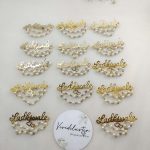 Ladkiwale brooch with intricate designs, featuring pearls and red beads. Ideal for nikah ceremonies, wedding favors, bridal badges