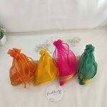 multi-colored tissue potli bags, ideal for wedding favors, nikah ceremonies, and gift hampers. Perfect for birthdays, anniversaries
