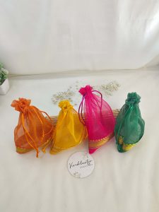 multi-colored tissue potli bags, ideal for wedding favors, nikah ceremonies, and gift hampers. Perfect for birthdays, anniversaries