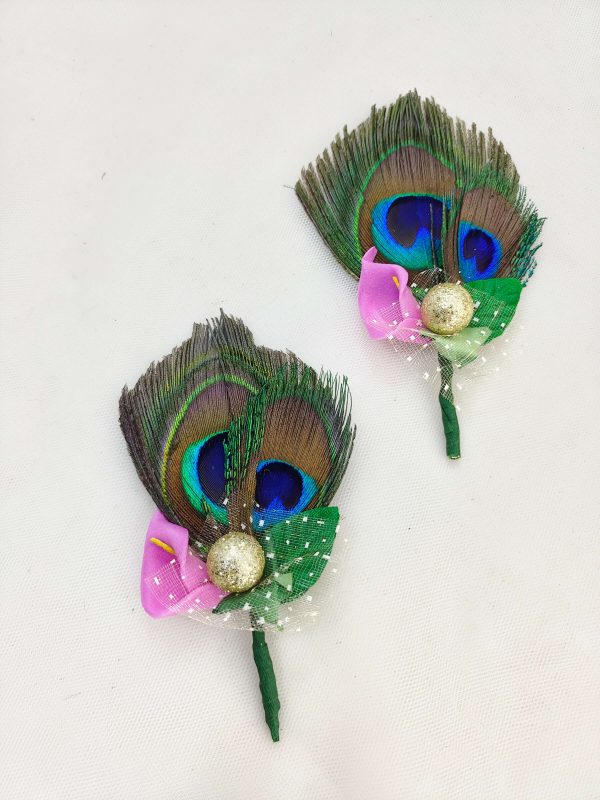 Peacock feather brooches with a pink flower and golden ornament, ideal for wedding favors and baraati coat accessories