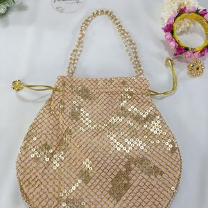 A refined Sippy Gota Potli with a golden lattice of sequins on blush pink fabric. This elegant potli is ideal for weddings, bridal showers, and nikah ceremonies, serving as a beautiful wedding favor or giveaway for bridesmaids