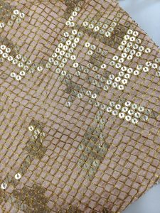 ippy Gota Potli featuring a golden sequin design on a pink base. The drawstring closure adds charm, making it a perfect accessory for weddings, nikah ceremonies, or as a thoughtful wedding favor or bridesmaid gift.