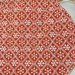 Classic red Embroidery Wedding Potli with white patterns, suitable for use as a wedding favor, bridesmaid gift, or bride's accessory