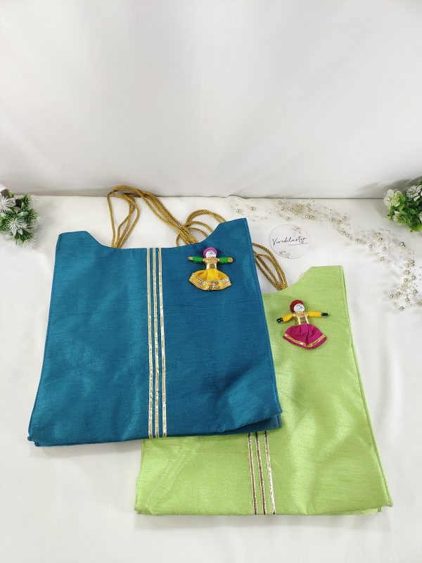 Vibrant blue and green potli bags adorned with charming doll embellishments, perfect for wedding favors, nikah ceremonies, bridal shower gifts