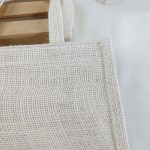 A natural jute potli bag with intricate lace detailing, designed to complement any wedding theme. Perfect for nikah ceremonies, bridal showers, and as a thoughtful bridesmaid gift