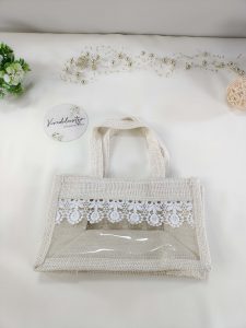 A delicate jute bag with lace details, perfect for wedding favors, nikah ceremonies, and bridal showers. This bag is ideal for bridesmaid gifts