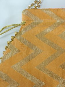 Lehariya printed bag with zigzag patterns. These bags are perfect for weddings and bridesmaids return favor