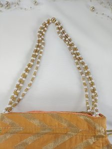 zigzag printed bags, each with a distinct zigzag pattern in yellow, orange, and pink. Ideal for use as wedding favor Nikah ceremonies and other wedding events