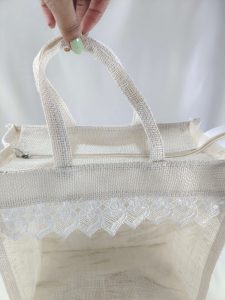 A delicate jute bag with lace details, perfect for wedding favors, nikah ceremonies, and bridal showers. This bag is ideal for bridesmaid gifts