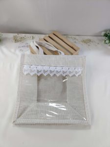 A beautifully crafted jute bag adorned with delicate lace, perfect for wedding favors, nikah ceremonies, and bridal shower gifts