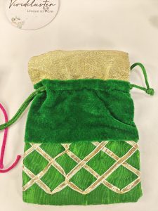 potli bags in green and gold color adorned with a golden lattice pattern, ideal for bridal accessories, wedding favors, and birthday coin gifts.