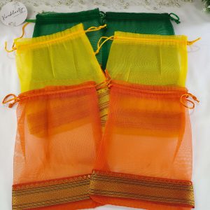 A colorful collection of tissue potli bags, perfect for wedding favors, nikah ceremonies, and special occasions. These bags are ideal for gift hampers