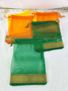 A set of vibrant tissue potli bags, perfect for wedding gifts, nikah ceremonies, and birthday celebrations. These bags are also ideal for anniversary gifts