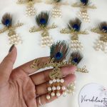 Ladkewale brooch, featuring delicate pearls and a feather ideal for baaratis and the Nikah ceremony